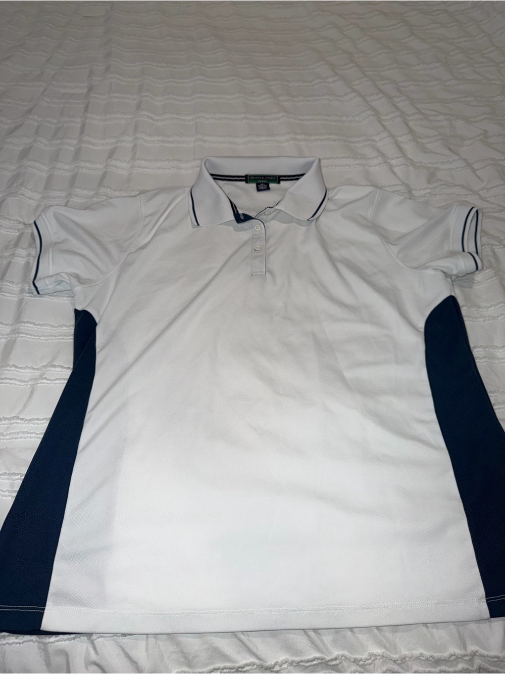 Woman’s White Golf Polo with Navy Side Panels